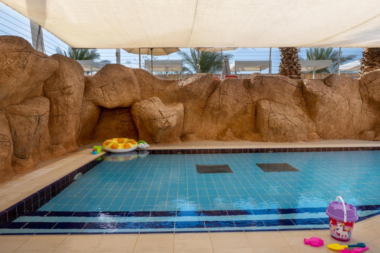 Vert Hotel Eilat By Afi Hotels Esterno foto The swimming pool at the Dead Sea Spa Magdala